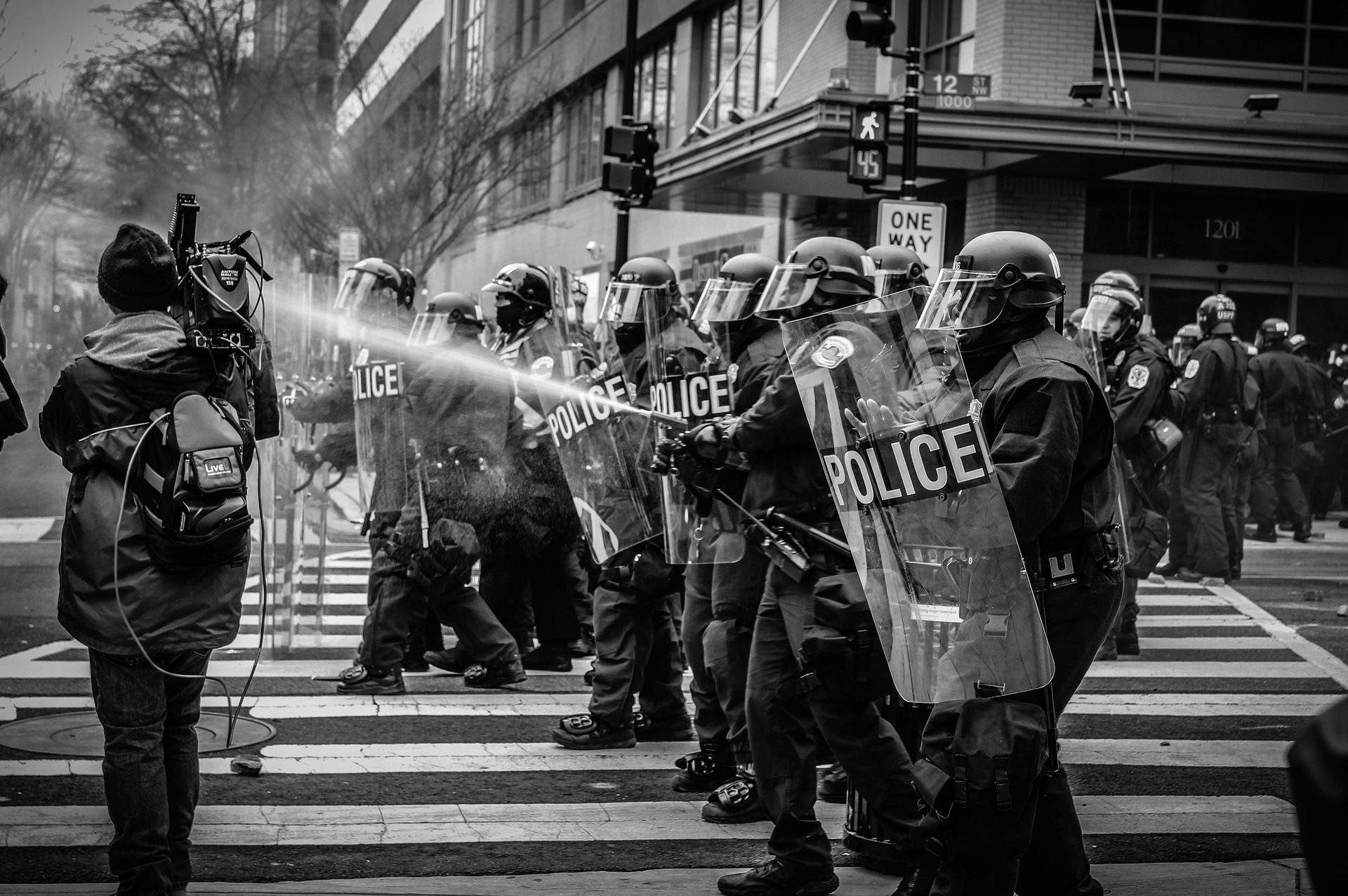 police hosing protesters