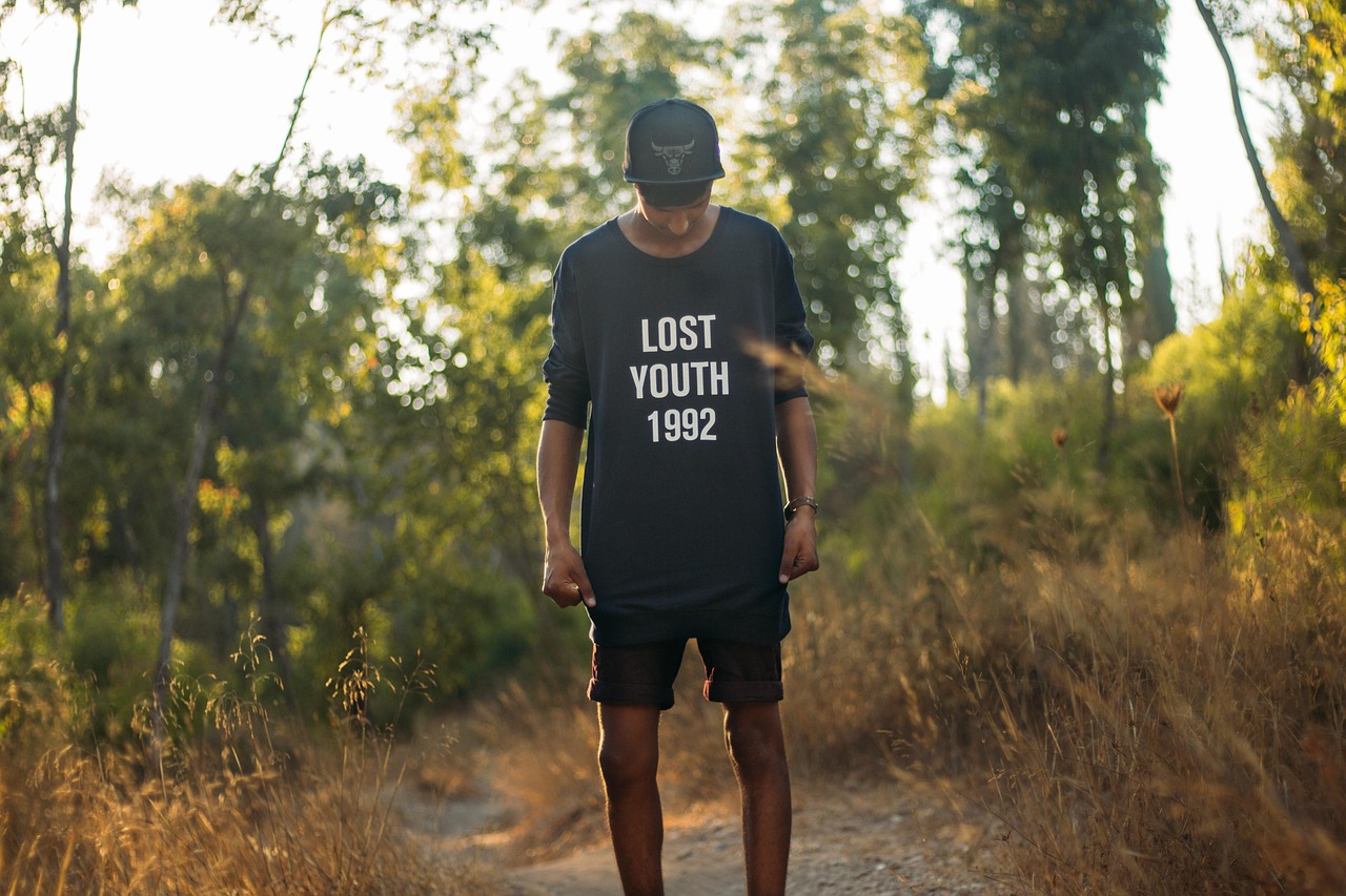 boy with "lost youth 1992" T-shirt